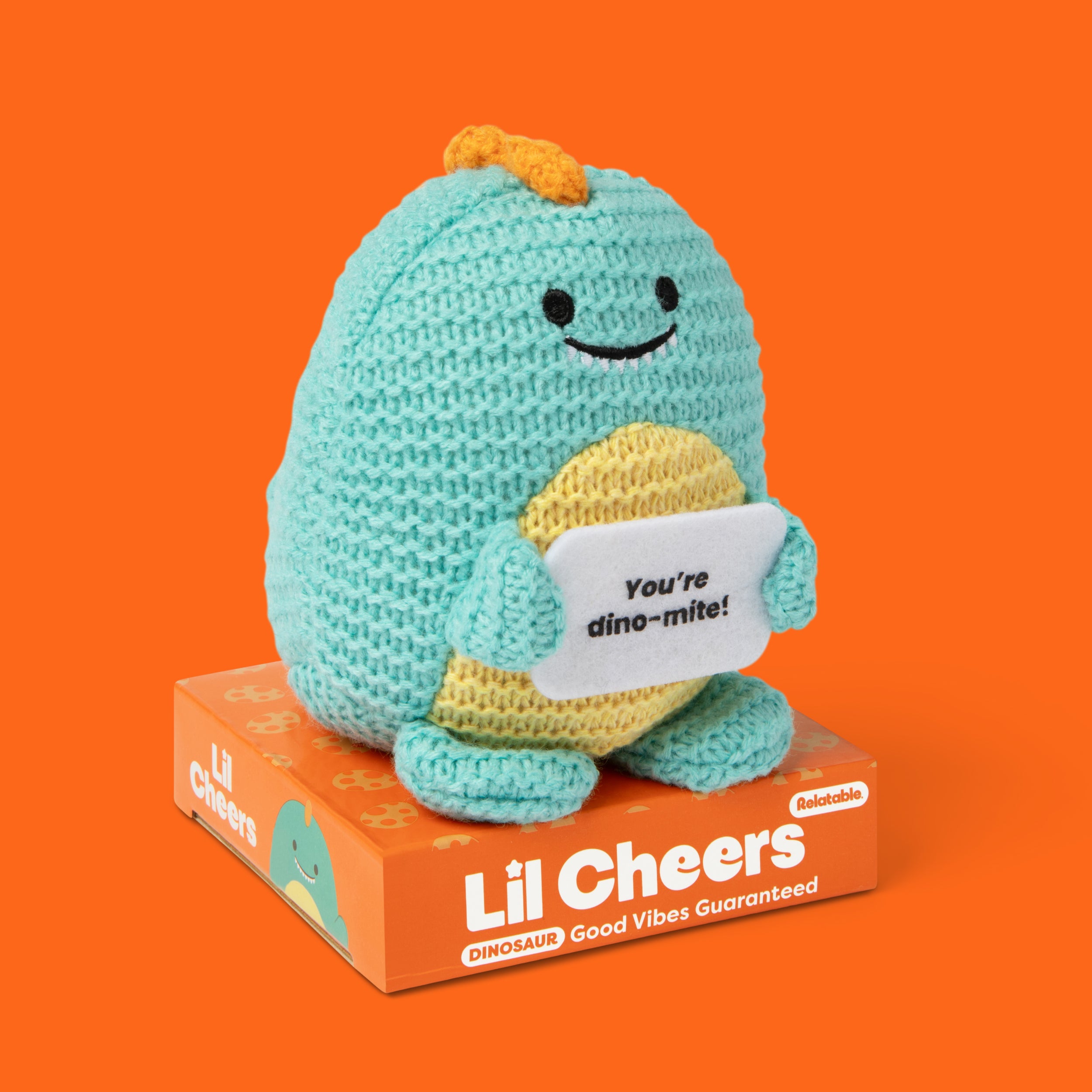 Lil Cheers Dino by Relatable – Cute Crochet Dinosaur Plush with Motivational Sign, Easter Gift & Uplifting Desk Decor